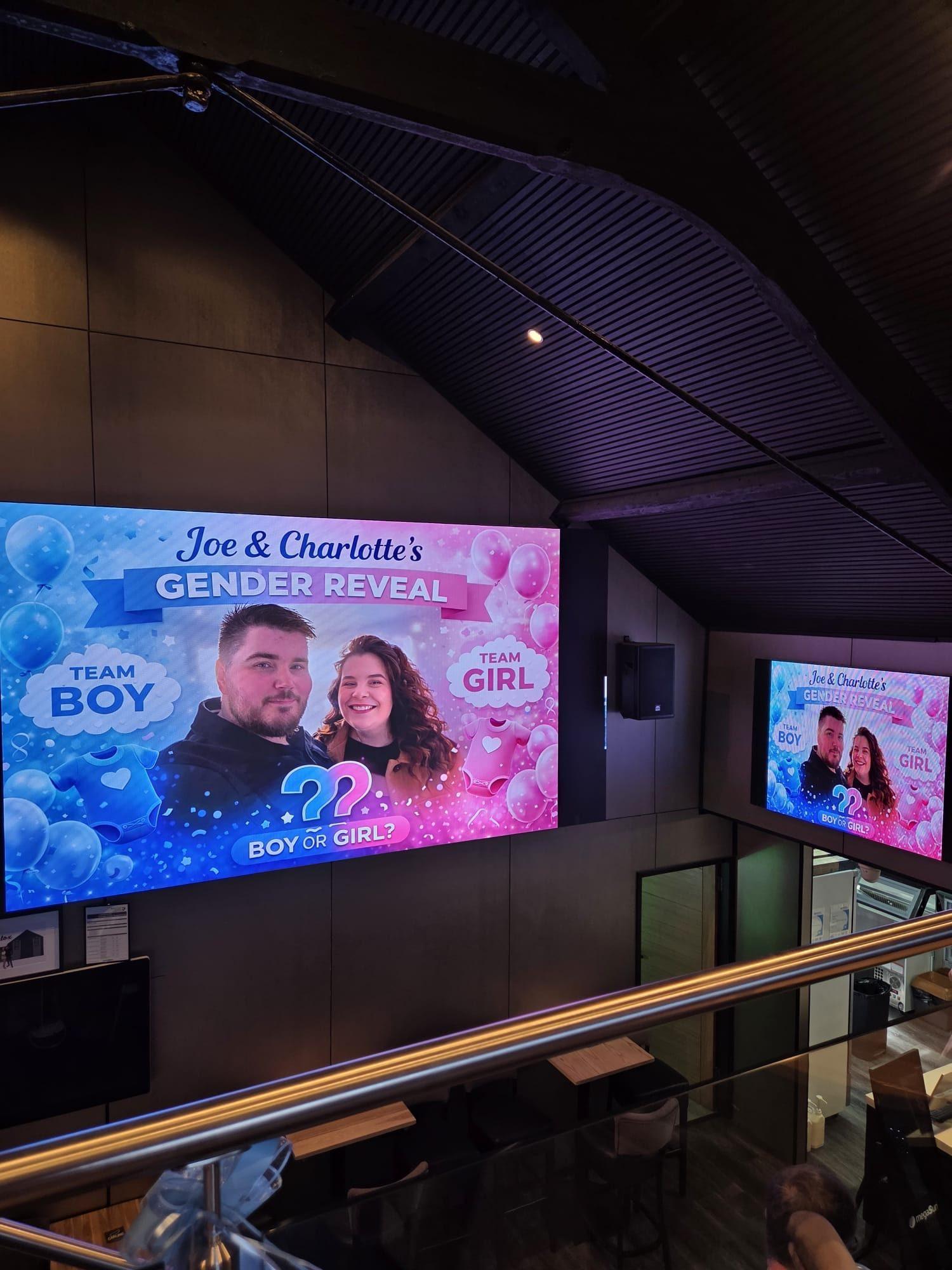 Gender reveal displayed on the big screen in the function room at The Lounge Rotherham